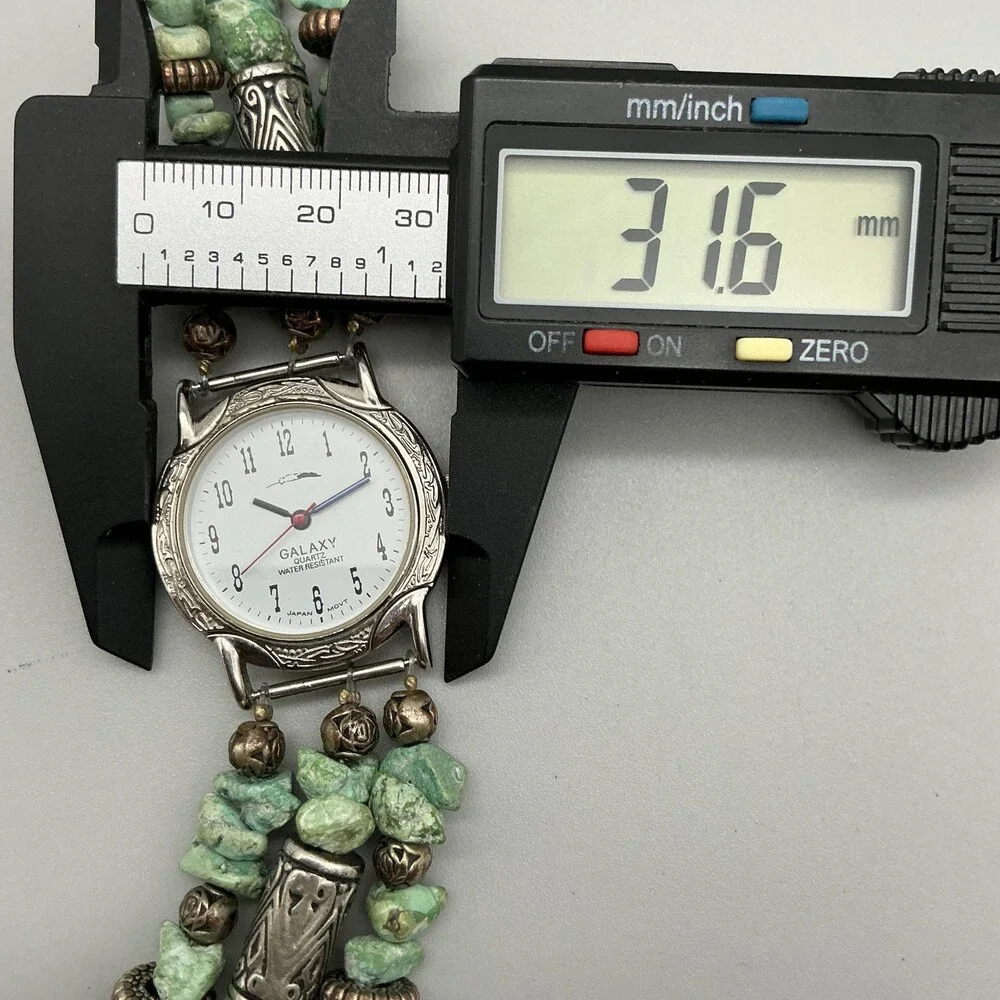 Galaxy Womens Watch 32mm Silver Tone Green Stone Beaded New Battery 7.25